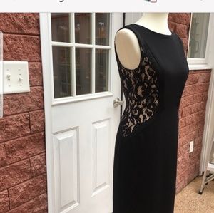 Gorgeous Black sheath with lace on sides.